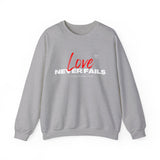 Love Never Fails Unisex Heavy Blend™ Crewneck Sweatshirt